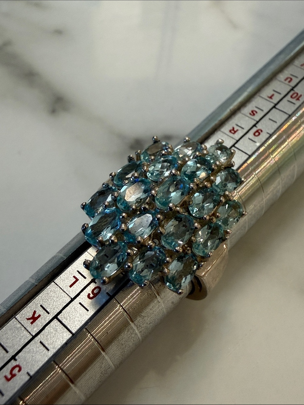 Silver ring with cluster of blue stones, size 7